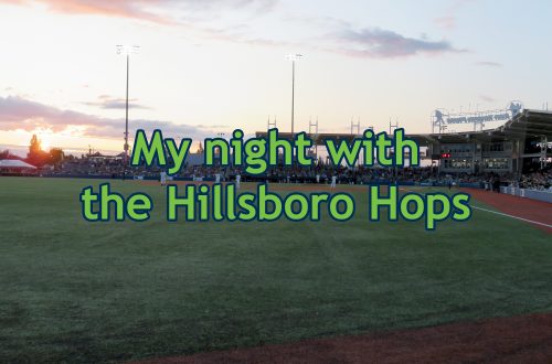 Overview of a baseball stadium from the outfield facing the grandstand with text overlaying the image that says "My night with the Hillsboro Hops."